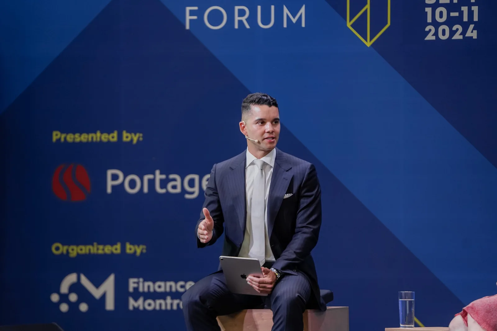 Conor Delanbanque leading a panel at the Canada Fintech Forum